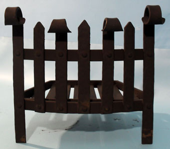 Bowed front fire grate with hand forged scrolls and spears