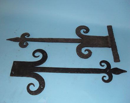 Door bracket (either real hinge or dummy hinge) with hand forged scrolls