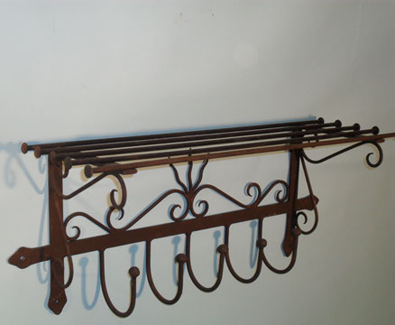 Hat and coat rack - eye catching wall hanging rack with plenty of forge work.